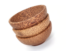 Load image into Gallery viewer, Stack of three natural coconut shell bowls
