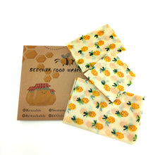 Load image into Gallery viewer, Reusable beeswax food wrap with a pineapple theme
