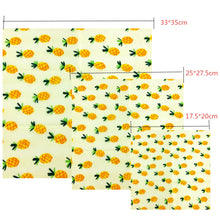 Load image into Gallery viewer, Reusable beeswax food wrap with a pineapple theme
