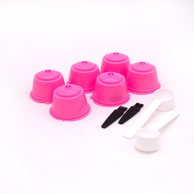 Six pink reusable coffee capsules for Nespresso