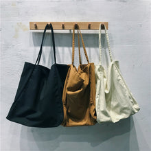 Load image into Gallery viewer, Three sustainable natural brown and black canvas tote bags accessories and gifts
