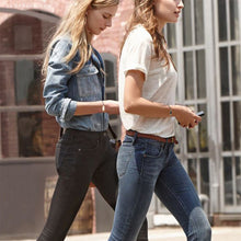 Load image into Gallery viewer, Two girlfriends wearing a white and a black lava friendship bracelet
